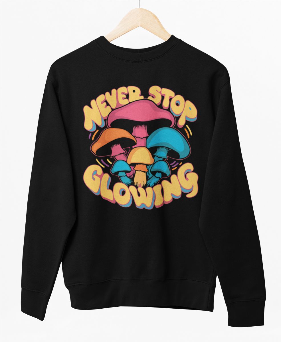 Svart UNISEX sweatshirt ”Never stop glowing”